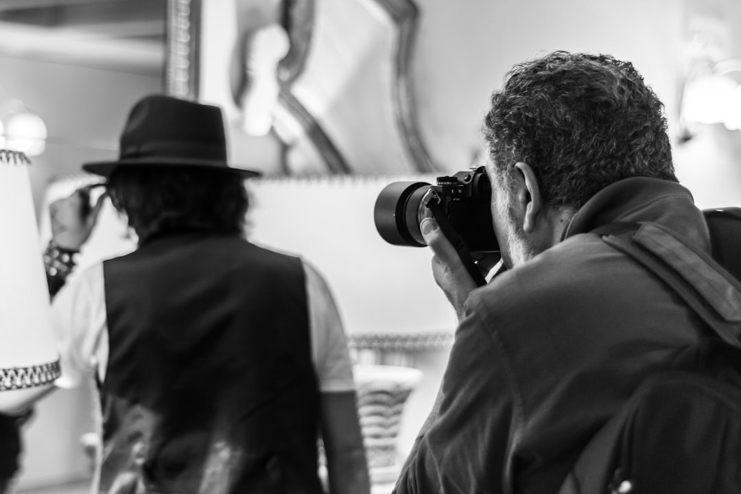 Team of documentary photographers reviewing photos together