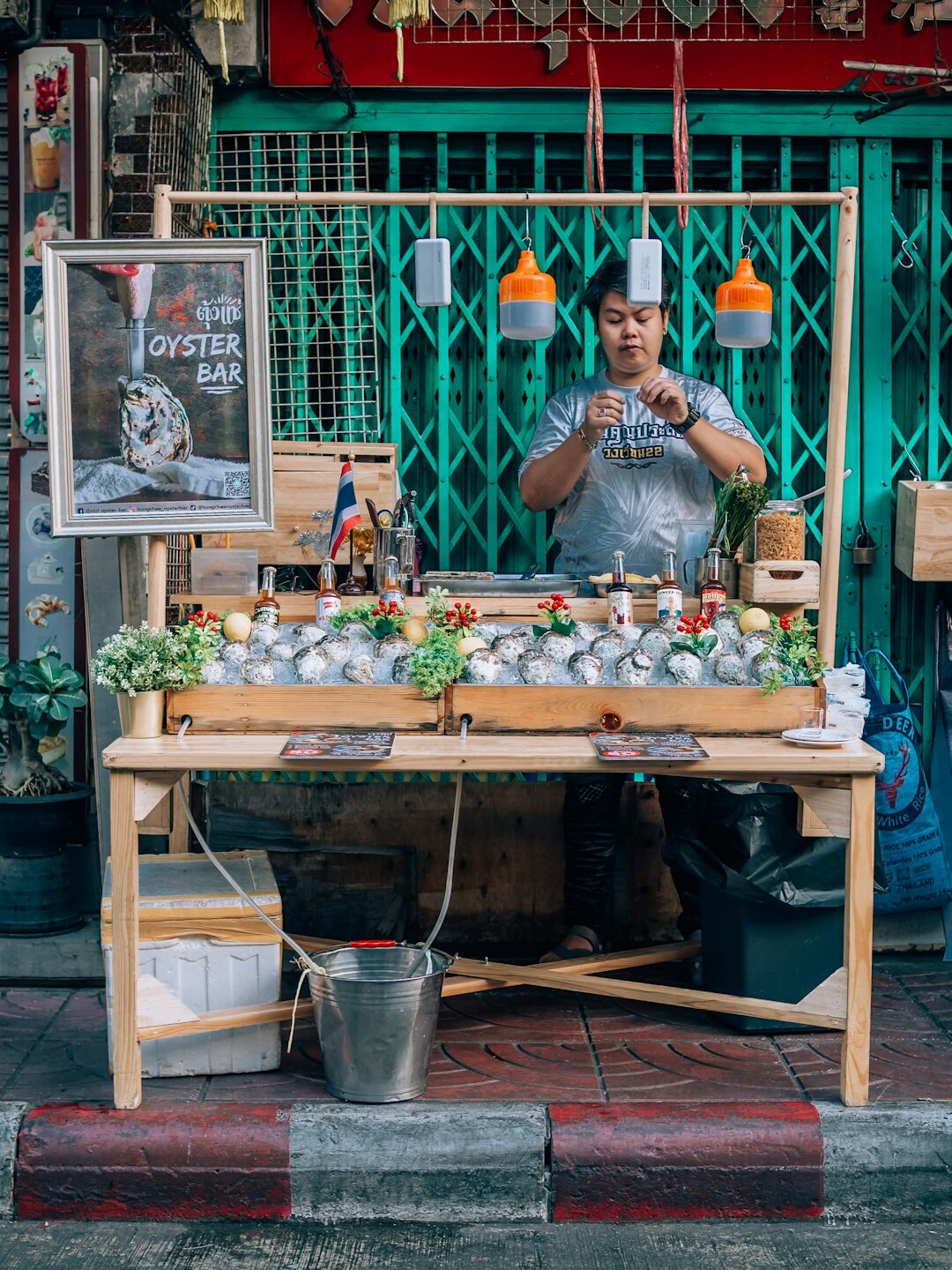 man selling cheese at stall