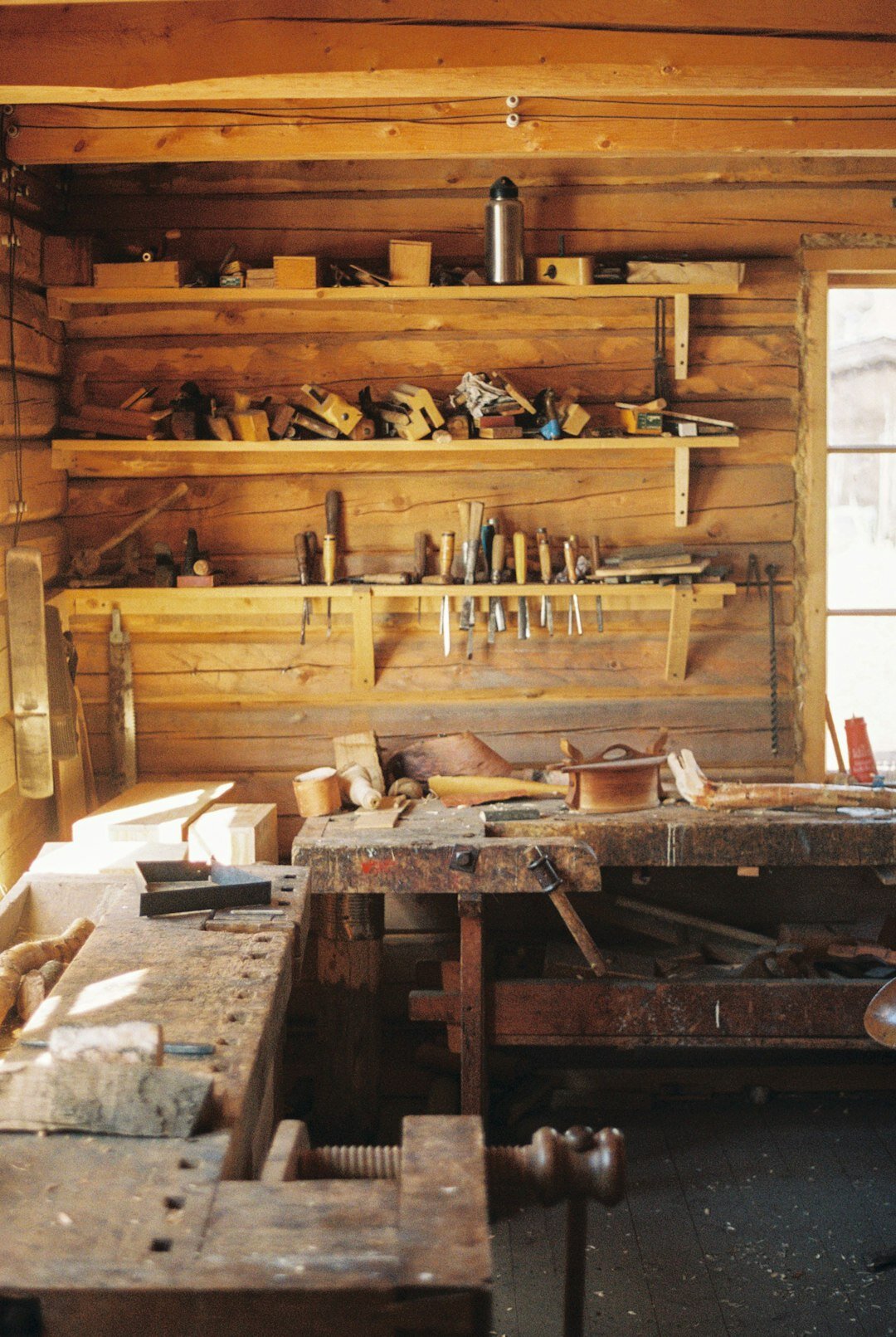 Danish carpenter working in a wood workshop